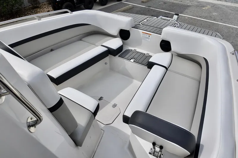 Slide: The Image of 2026 Starcraft SVX 191 OB CC boat interior with sleek white seating and modern design. - 17