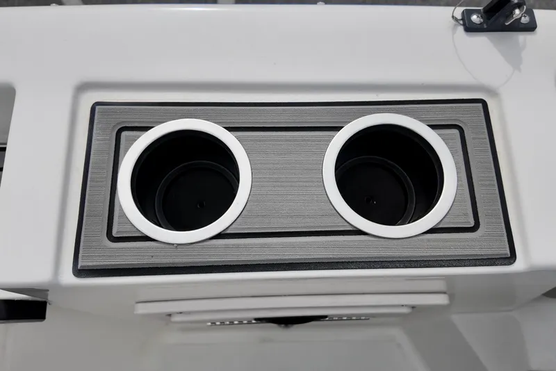 Slide: The Image of 2026 Starcraft SVX 191 OB CC boat cup holders, sleek design, gray and white finish. - 6