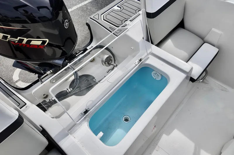 Slide: The Image of 2026 Starcraft SVX 191 OB CC boat interior with Yamaha VMAX engine and livewell. - 9