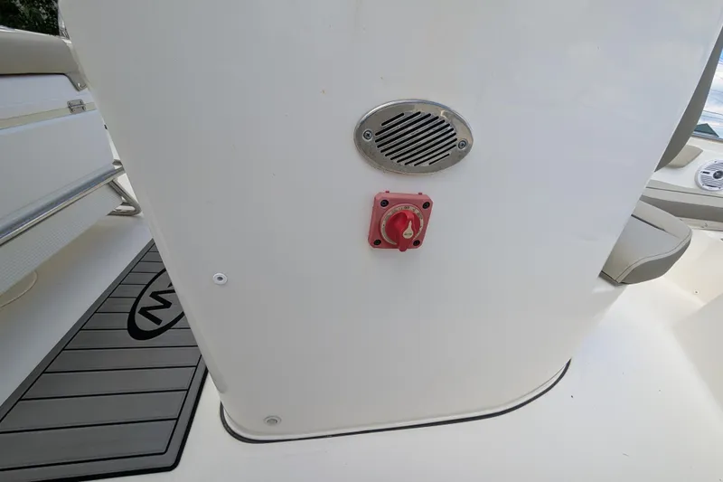 Slide: The Image of 2023 Key West 203 FS boat interior with speaker and control switch. - 11