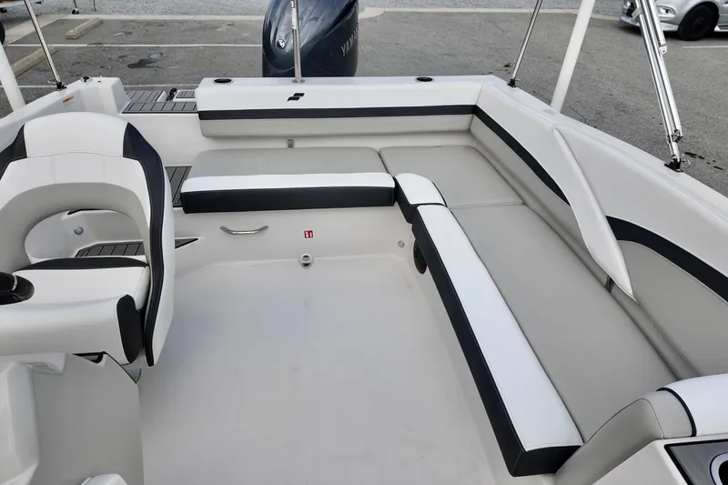 Slide: The Image of 2026 Starcraft SVX 191 OB boat interior with white and black seating, showcasing modern design. - 7