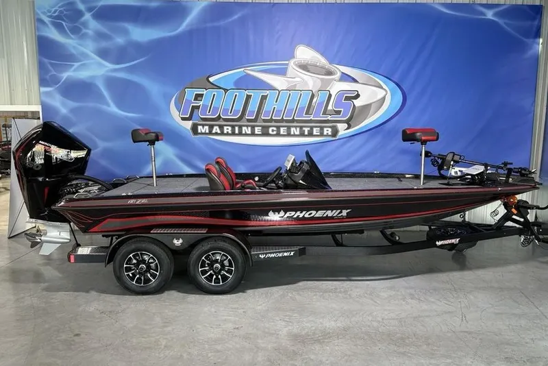 Slide: The Image of 2026 Phoenix 721 ZXL boat at Foothills Marine Center display. - 2