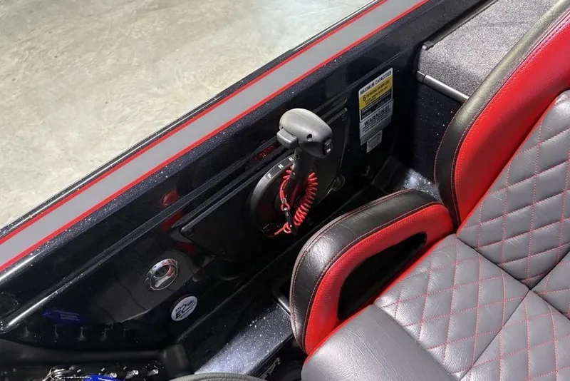 Slide: The Image of Interior of 2026 Phoenix 721 ZXL with red and black quilted seats. - 22