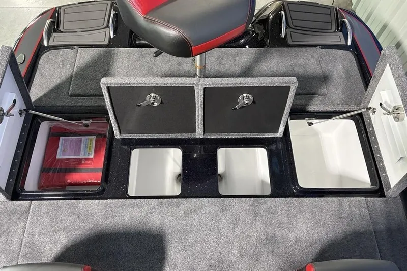 Slide: The Image of 2026 Phoenix 721 ZXL boat interior with storage compartments and seating. - 26