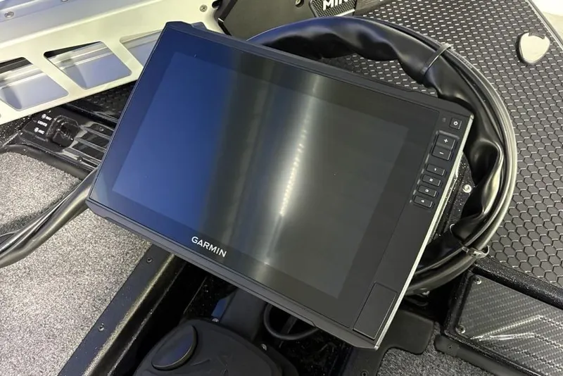 Slide: The Image of Garmin display on 2026 Phoenix 721 ZXL boat dashboard, featuring advanced navigation technology. - 7