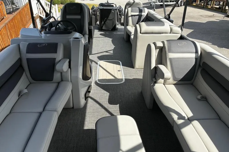 Slide: The Image of 2024 Barletta Cabrio 24CC pontoon boat interior with luxurious seating and modern design. - 10