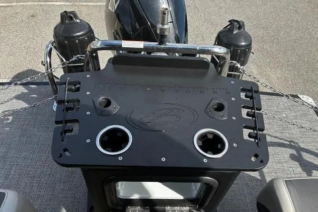 Slide: The Image of 2024 Barletta Cabrio 24CC boat with fishing station and rod holders. - 18