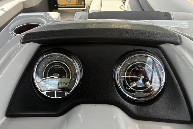 Slide: The Image of Dashboard of 2024 Barletta Cabrio 24CC with RPM and speed gauges. - 26
