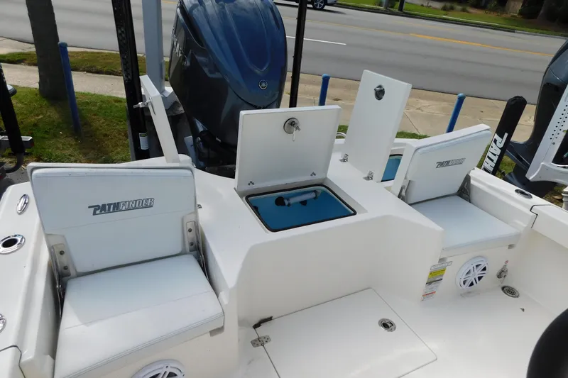 Slide: The Image of 2025 Pathfinder 2500 Hybrid boat interior with seating and storage compartments. - 12