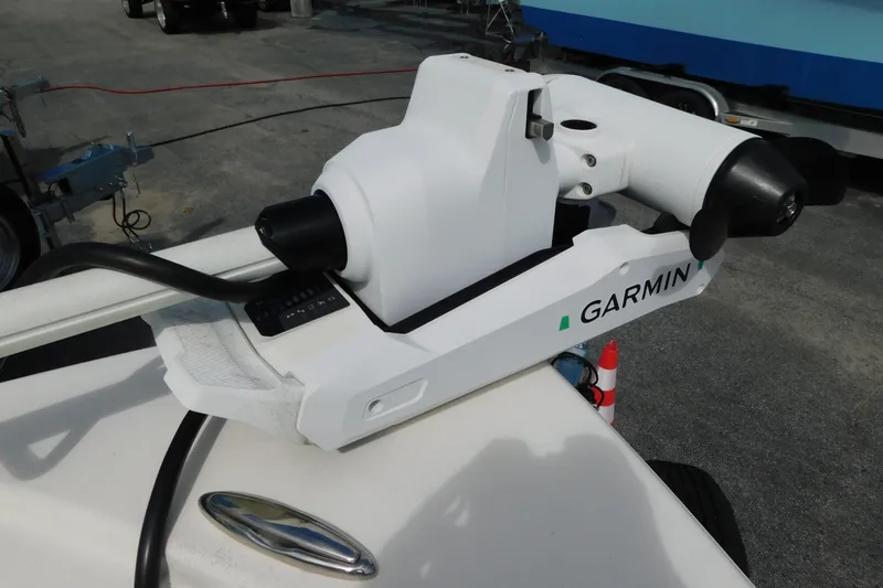 Slide: The Image of Garmin marine equipment on 2025 Pathfinder 2500 Hybrid boat, docked on concrete surface. - 20