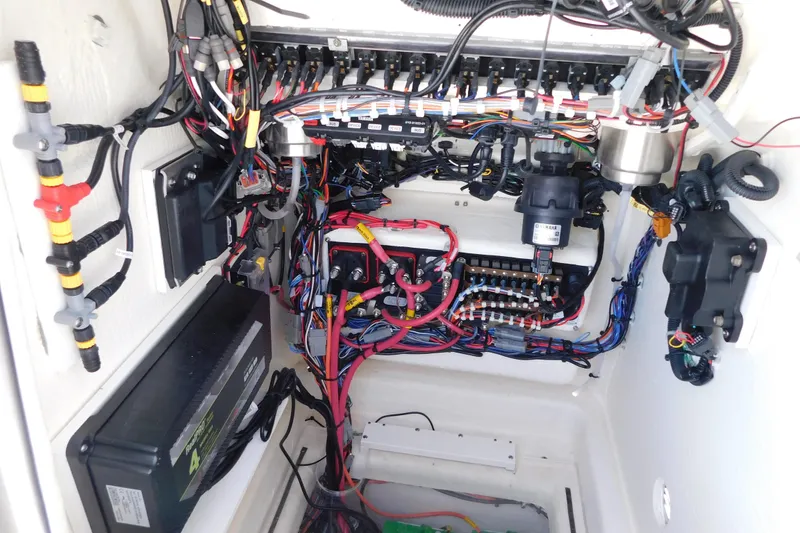 Slide: The Image of Electrical wiring system inside 2025 Pathfinder 2500 Hybrid boat, showcasing complex connections. - 29