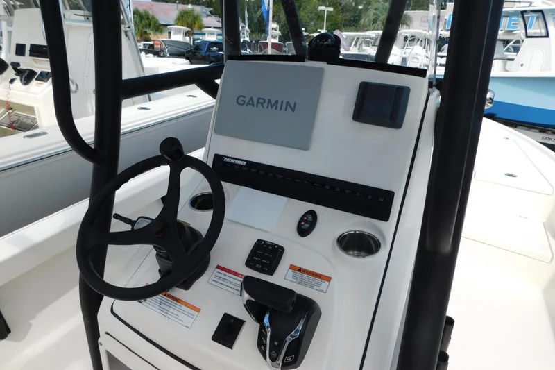 Slide: The Image of 2025 Pathfinder 2500 Hybrid boat console with Garmin navigation system. - 6