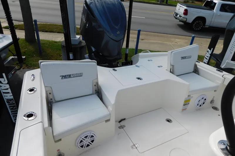 Slide: The Image of 2025 Pathfinder 2500 Hybrid boat interior with seating and storage compartments. - 8