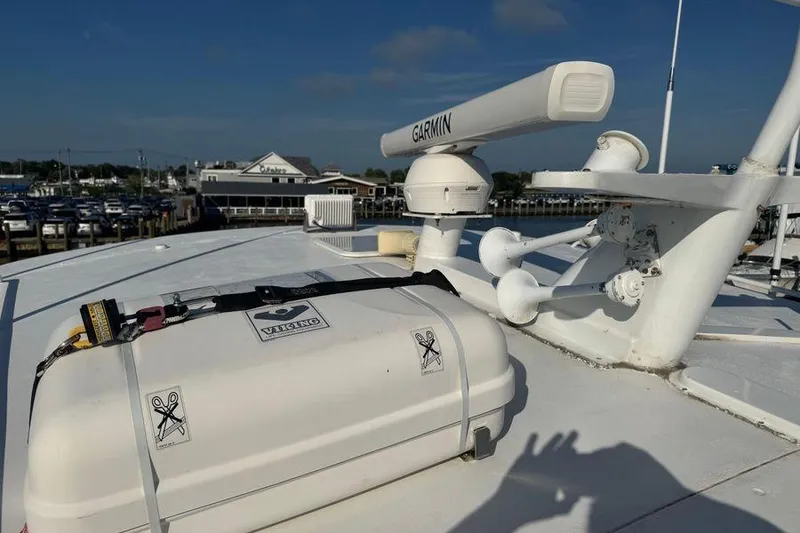 Slide: The Image of Rooftop of 2002 Viking 61 Enclosed Bridge with Garmin radar and equipment. - 32