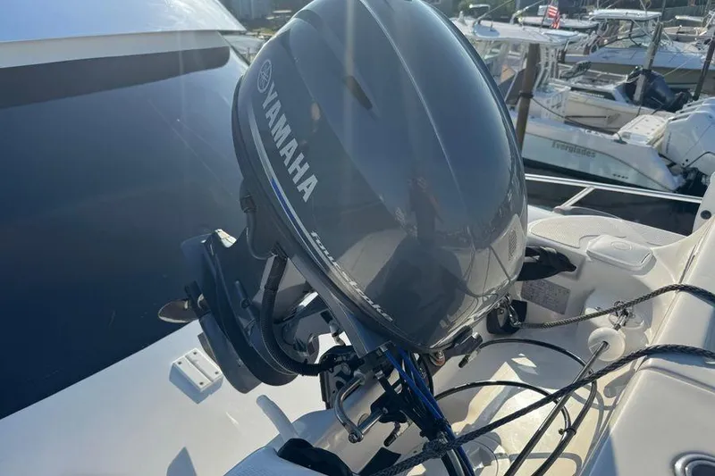 Slide: The Image of Yamaha outboard motor on 2002 Viking 61 Enclosed Bridge yacht, docked in marina. - 43