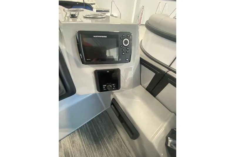 Slide: The Image of 2026 Bentley Pontoons Legacy 223 Swingback dashboard with Humminbird electronics display. - 14