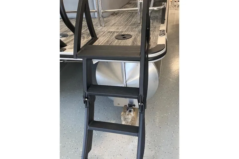 Slide: The Image of 2026 Bentley Pontoons Legacy 223 Swingback with boarding ladder on display. - 4