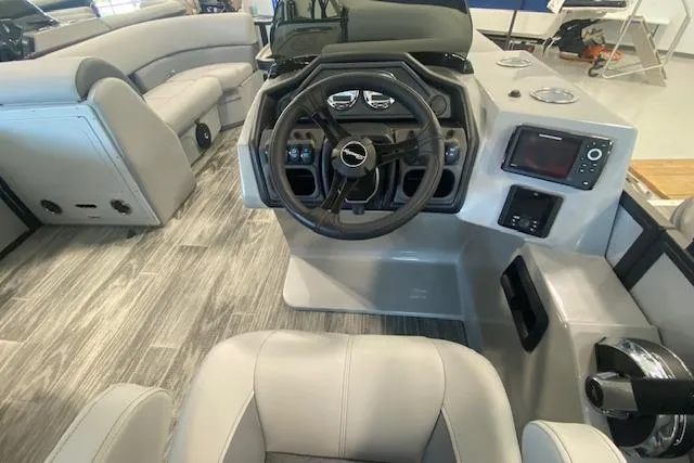 Slide: The Image of 2026 Bentley Pontoons Legacy 223 Swingback interior with modern helm and luxurious seating. - 9