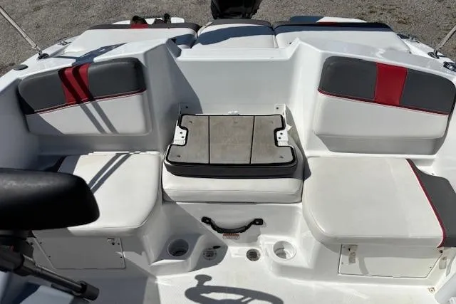 Slide: The Image of 2020 Tahoe T16 boat interior with white and red seating, storage compartments. - 75