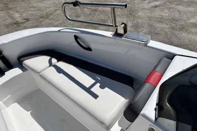 Slide: The Image of 2020 Tahoe T16 boat interior with white seating and stainless steel rail. - 84