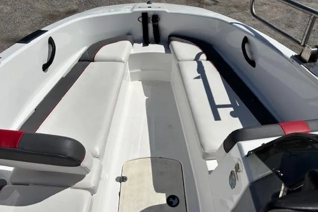 Slide: The Image of 2020 Tahoe T16 boat interior with white seating and black accents. - 85