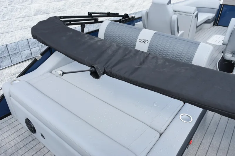 Slide: The Image of 2026 Bentley Pontoons Elite 253 Swingback interior with sleek seating and modern design. - 7