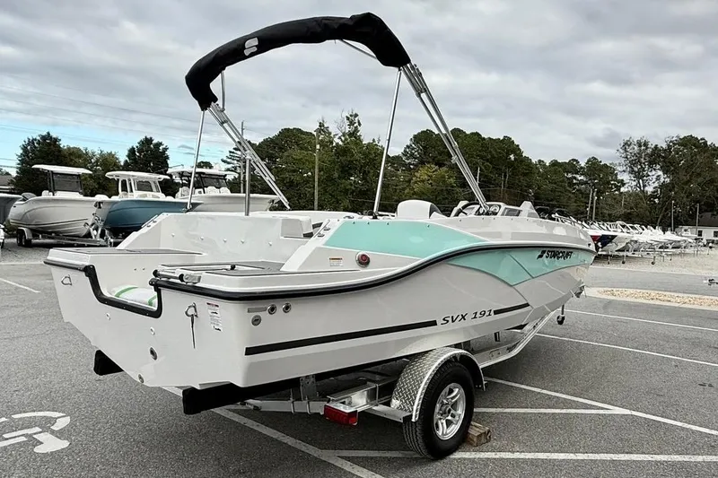 Slide: The Image of 2026 Starcraft SVX 191 OB boat on trailer in parking lot. - 2