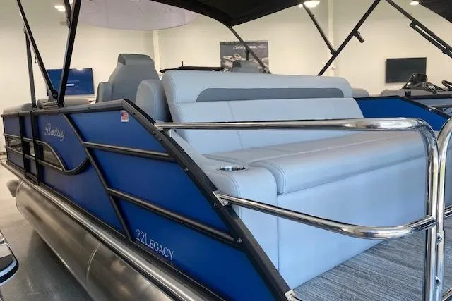 Slide: The Image of 2026 Bentley Pontoons Legacy 223 Swingback with sleek blue design and comfortable seating. - 6