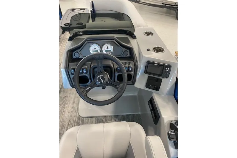Slide: The Image of 2026 Bentley Pontoons Legacy 223 Swingback dashboard with steering wheel and controls. - 8