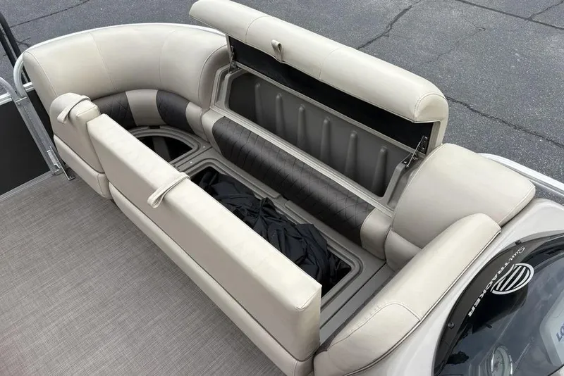 Slide: The Image of 2021 Sun Tracker Party Barge 20 DLX pontoon boat with open storage compartment. - 11