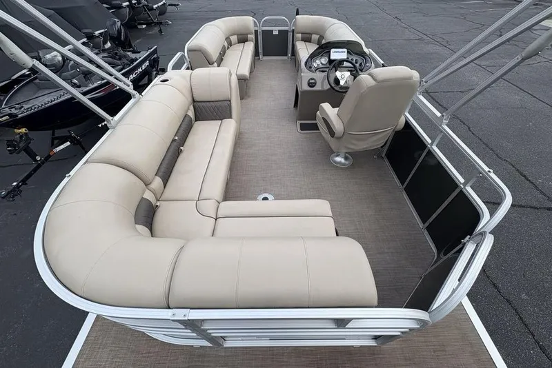 Slide: The Image of 2021 Sun Tracker Party Barge 20 DLX pontoon boat with spacious seating and helm. - 30