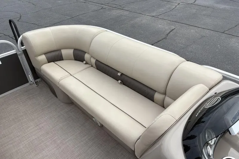 Slide: The Image of 2021 Sun Tracker Party Barge 20 DLX with beige seating and spacious deck. - 9