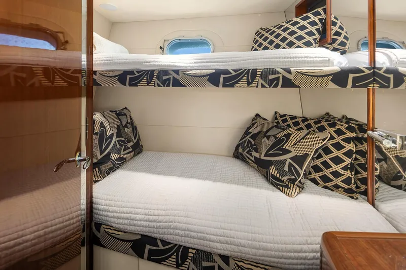Slide: The Image of Luxurious interior of 2001 Hatteras 63 Cockpit Motor Yacht with ocean view. - 17