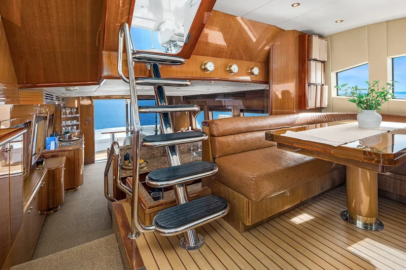 Slide: The Image of Luxurious helm of 2001 Hatteras 63 Cockpit Motor Yacht with panoramic ocean view. - 8