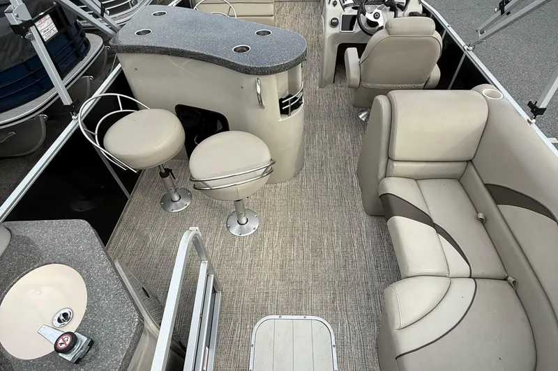 Slide: The Image of Interior of 2017 SunCatcher V22GT pontoon boat with seating and helm. - 11