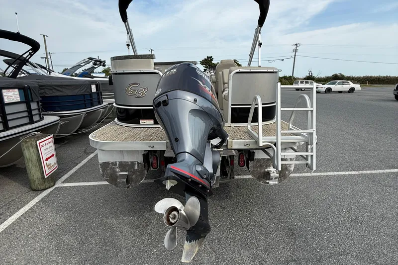 Slide: The Image of 2017 SunCatcher V22GT pontoon boat with outboard motor in parking lot. - 7