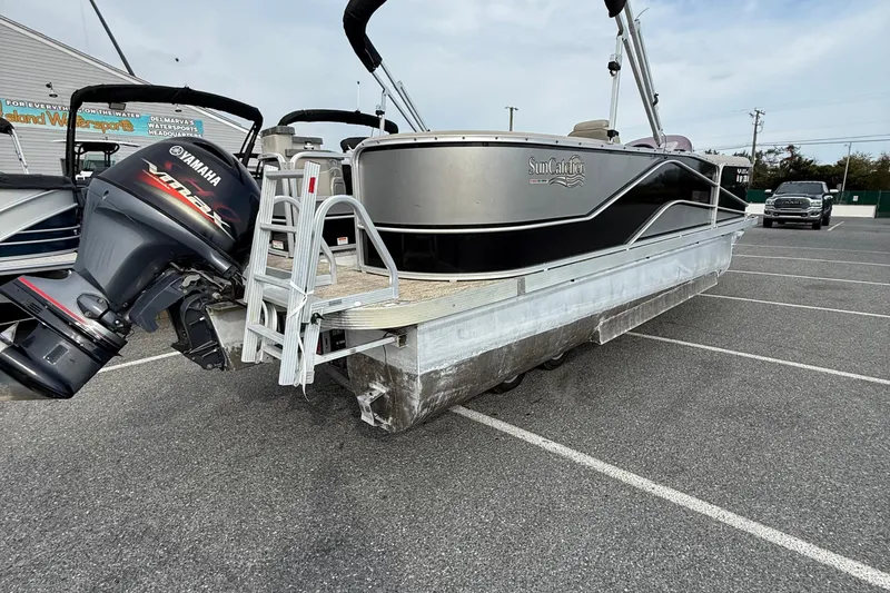 Slide: The Image of 2017 SunCatcher V22GT pontoon boat with Yamaha engine in parking lot. - 8