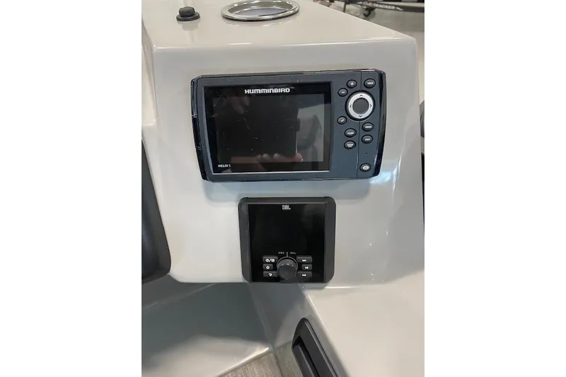 Slide: The Image of Control panel of 2026 Bentley Pontoons Legacy 243 Navigator with Humminbird and JBL systems. - 11