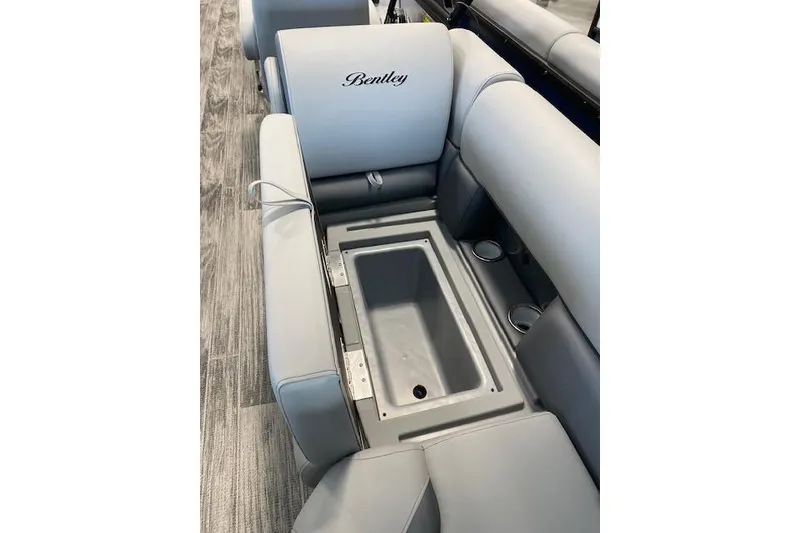 Slide: The Image of 2026 Bentley Pontoons Legacy 243 Navigator seating with built-in storage compartment. - 16