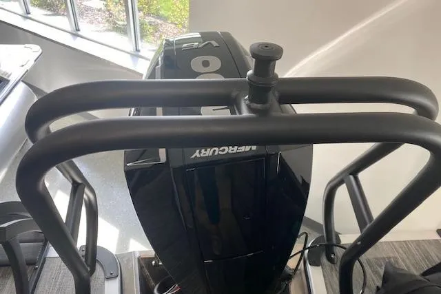 Slide: The Image of Outboard motor on 2026 Bentley Pontoons Legacy 243 Navigator, viewed from above. - 17