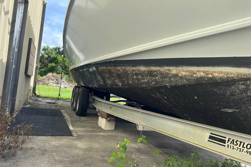 Slide: The Image of 1982 Robertson 3500 Custom Sportfish boat on trailer, showing hull condition. - 20