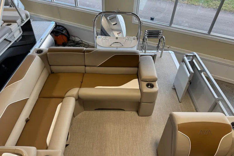 Slide: The Image of Interior of 2026 Avalon Venture 85 ELW pontoon boat with beige seating and modern helm. - 11