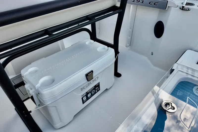 Slide: The Image of 2026 Starcraft SVX 191 OB CC boat interior with Igloo cooler and seating. - 11