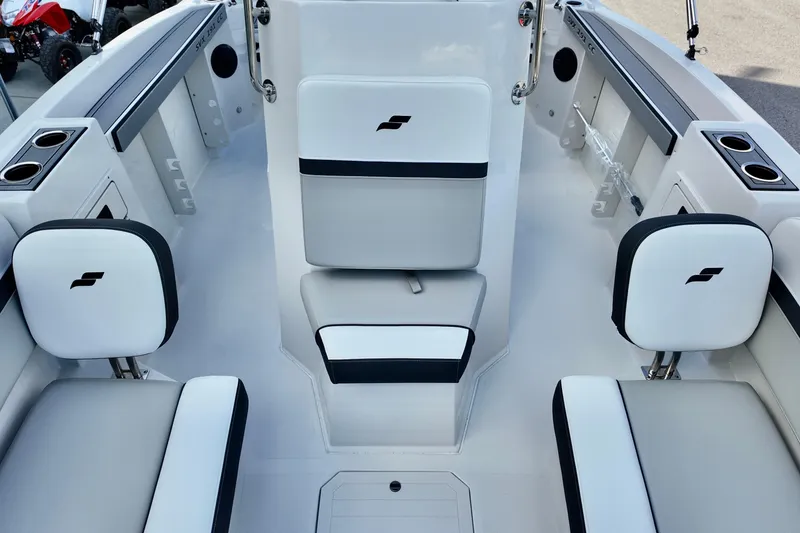 Slide: The Image of 2026 Starcraft SVX 191 OB CC boat interior with white and black seating. - 15