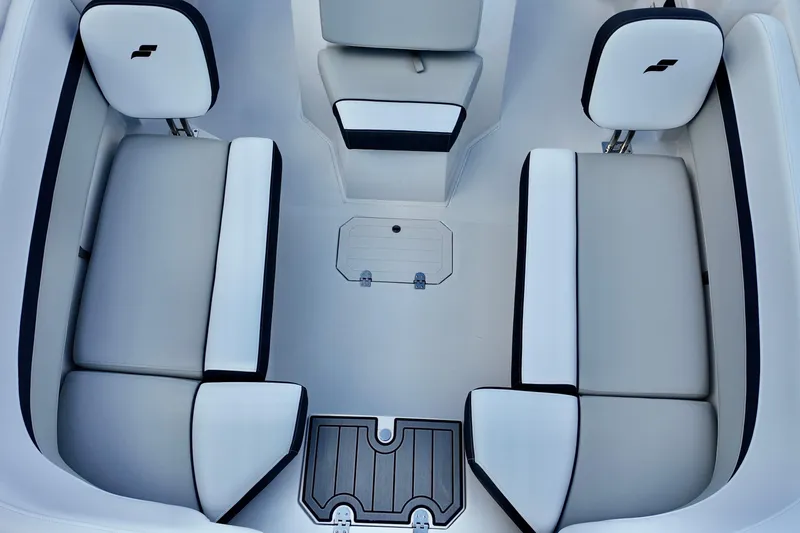 Slide: The Image of 2026 Starcraft SVX 191 OB CC boat interior with sleek seating and modern design. - 16