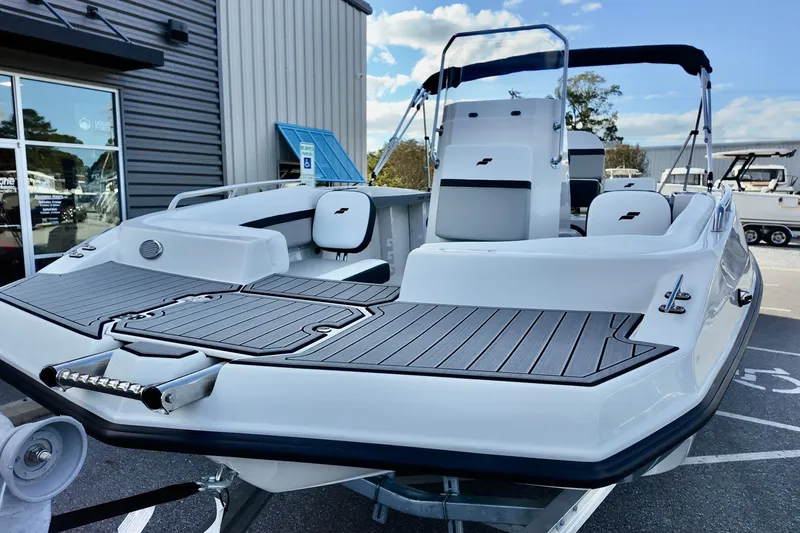 Slide: The Image of 2026 Starcraft SVX 191 OB CC boat, sleek design, modern features, outdoor display. - 3