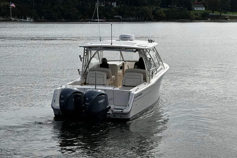 Slide: The Image of 2023 Grady-White Freedom 307 boat interior with luxurious seating. - 13