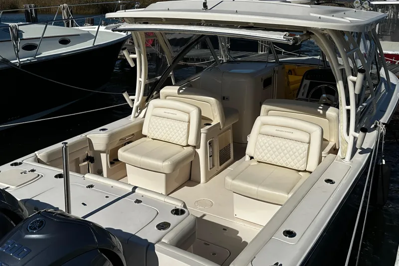Slide: The Image of 2023 Grady-White Freedom 307 boat interior with luxurious seating and modern design. - 17