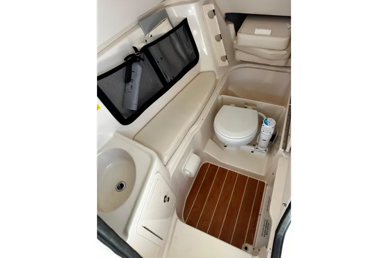 Slide: The Image of 2023 Grady-White Freedom 307 boat interior with toilet and sink. - 22