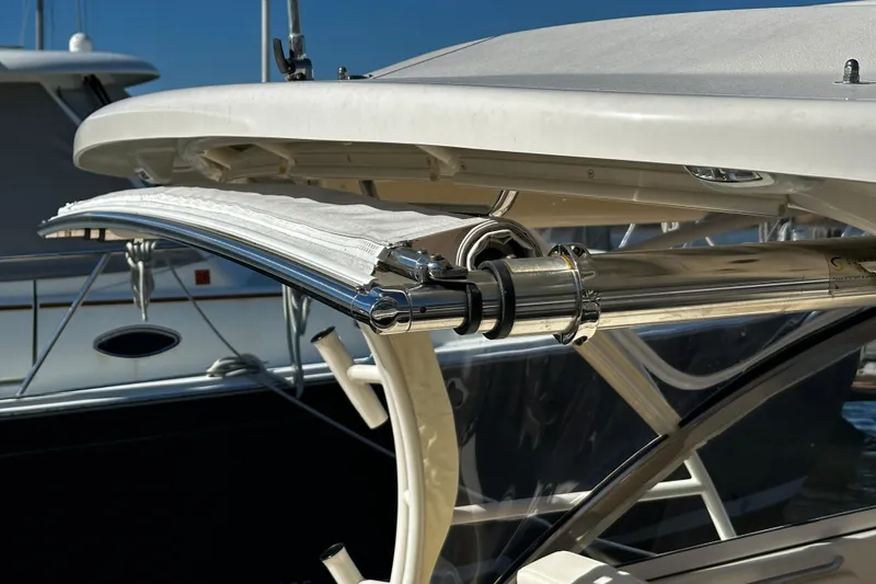 Slide: The Image of 2023 Grady-White Freedom 307 boat with stainless steel fittings and canopy detail. - 25